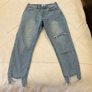 Light wash jeans, slightly distressed. Cropped. Size 26, little stretch
